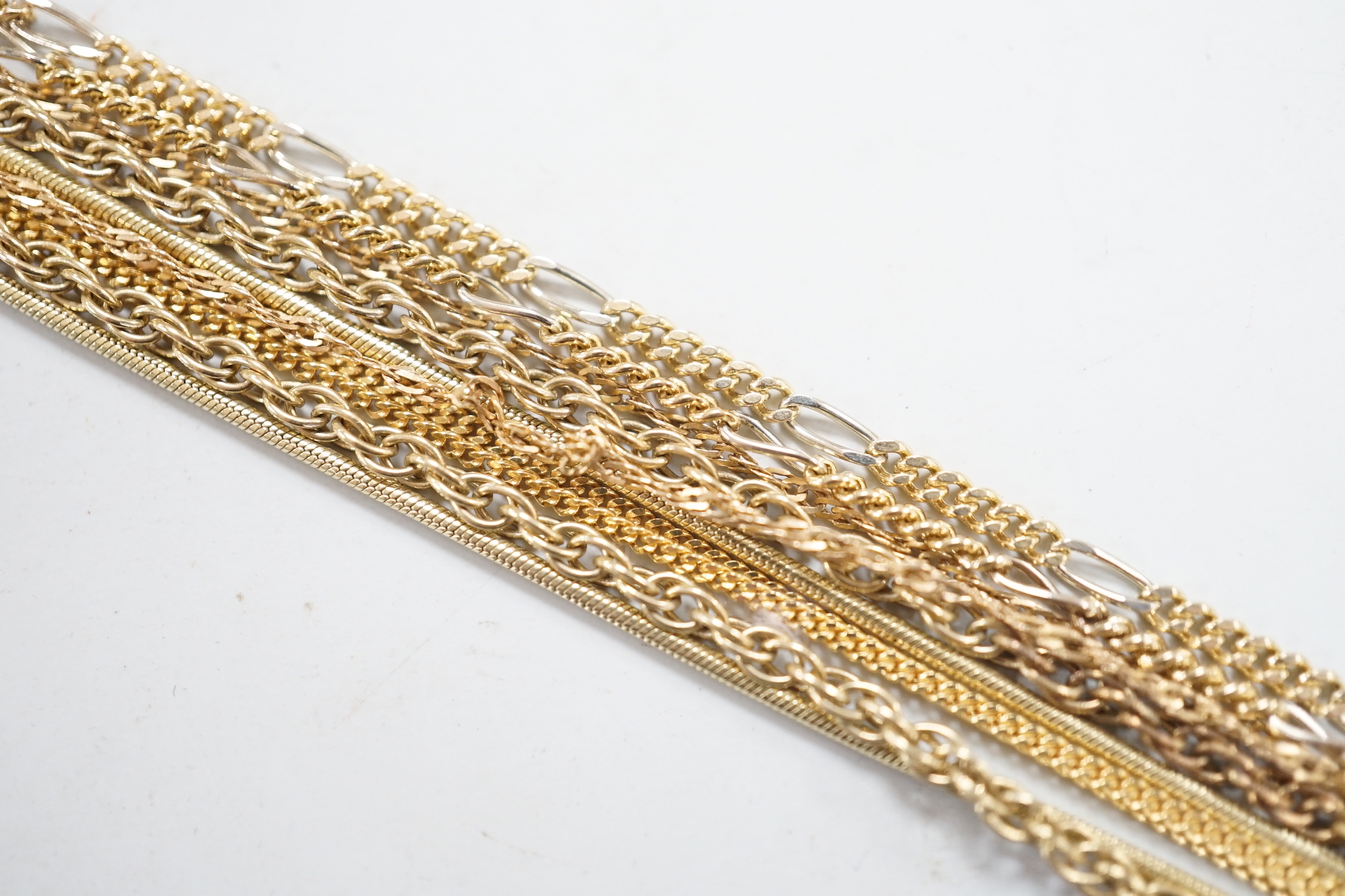 Five assorted modern 9ct gold chains including one two colour, longest 55cm, 16.6 grams.